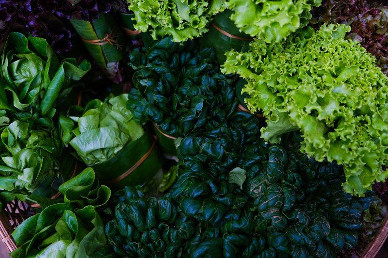 Green organic vegetables and dark leafy salad. healthy eating concept of fresh garden produce. Local market